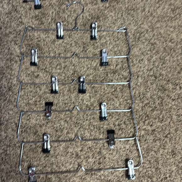 Bundle of two pants hangers with black rubber ends. - Picture 3 of 3